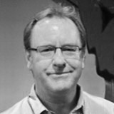 Black and white portrait of Graeme Evans