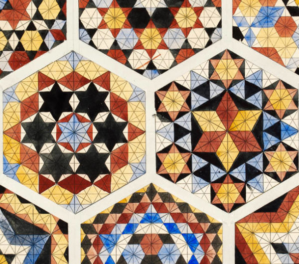 Collection of mosaic tiles with geometric shapes in red yellow and black colours