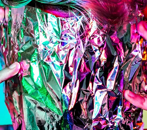 Male model with foil wrapped on his face