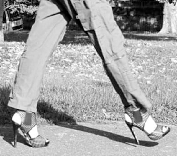 Female model walking in a park