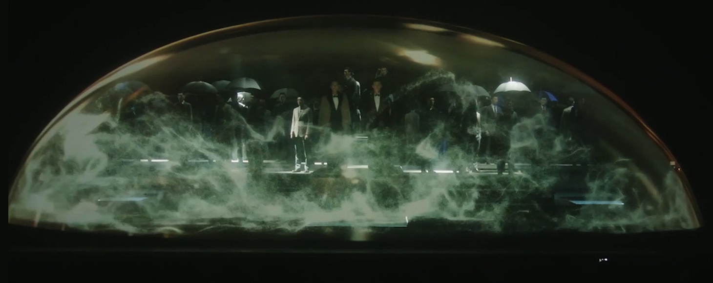 A menswear colllection is shown on the stage using holographic technology