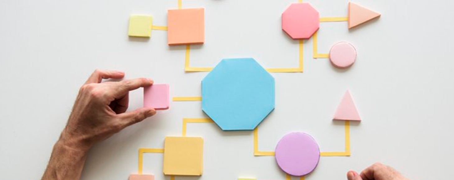 A board with triangles, circles and squares cut in different shapes